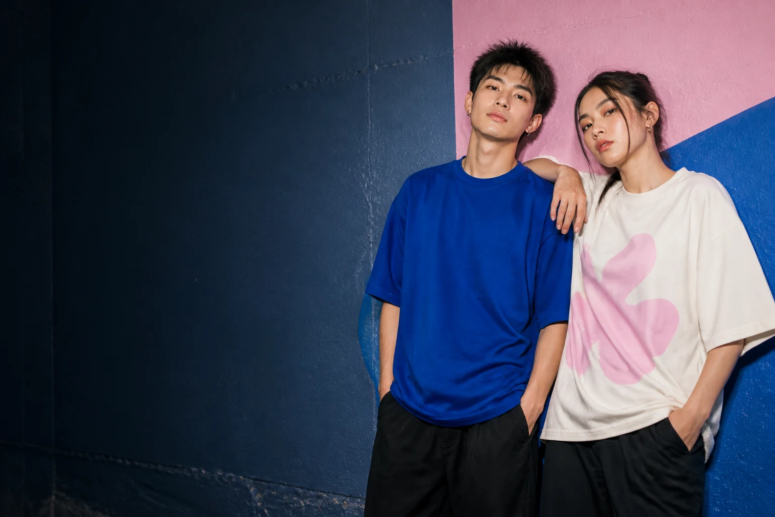 Concept image of models wearing blue and white T-shirts